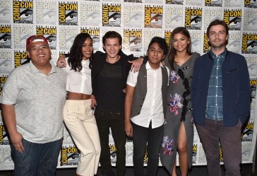 SAN DIEGO, CA - JULY 23: (L-R) Actors Jacob Batalon, Laura Harrier, Tom Holland, Tony Revolori, Zendaya and director Jon Watts from Marvel Studios? "Spider-Man: Homecoming? attend the San Diego Comic-Con International 2016 Marvel Panel in Hall H on July 23, 2016 in San Diego, California. ©Marvel Studios 2016. ©2016 CTMG. All Rights Reserved.  (Photo by Alberto E. Rodriguez/Getty Images for Disney)